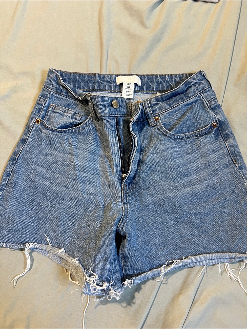 H&M Light Blue High-Rise Frayed Denim Shorts